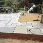 sand and patio blocks